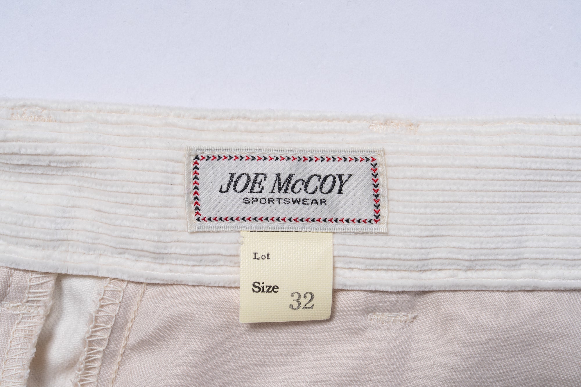 DOUBLE-PLEAT CORDUROY TROUSERS